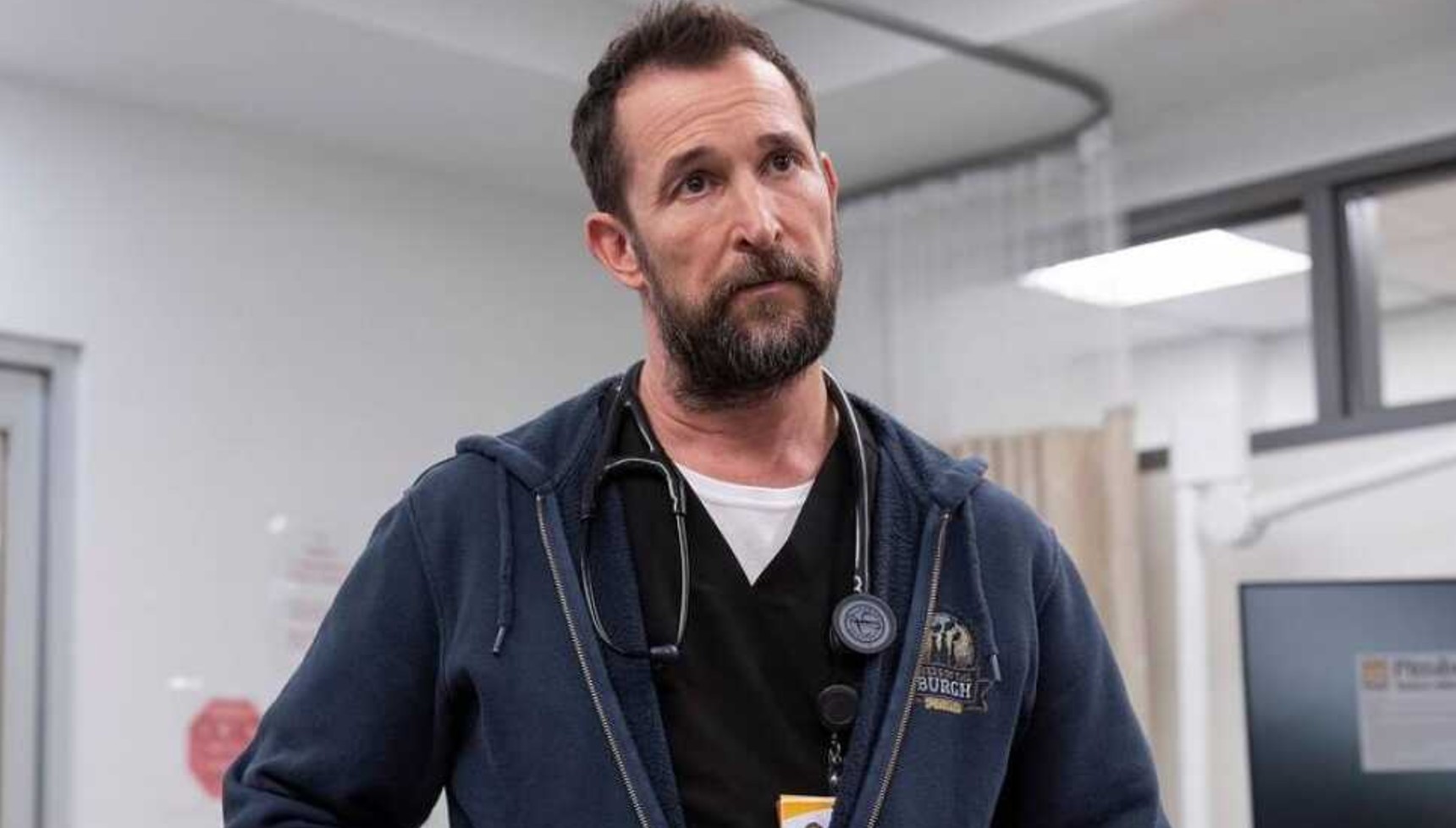 Noah Wyle in his doctor's uniform in The Pitt