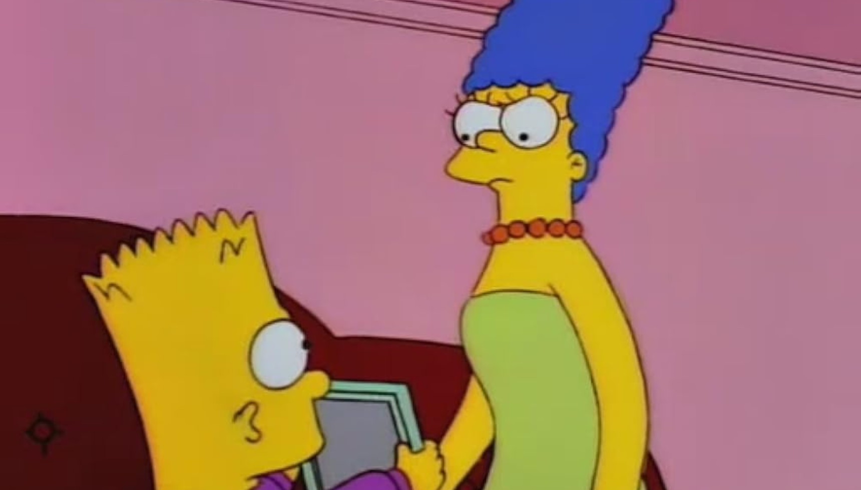 Bart showing a frame to Marge in The Simpsons