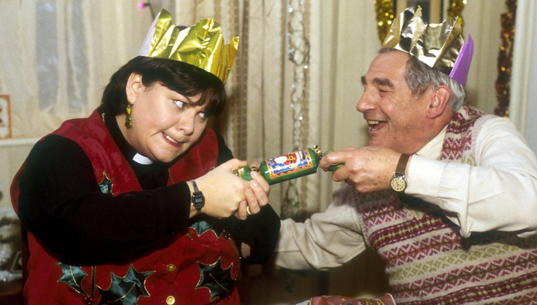 Dawn French pulling a Christmas cracker in Vicar of Dibley