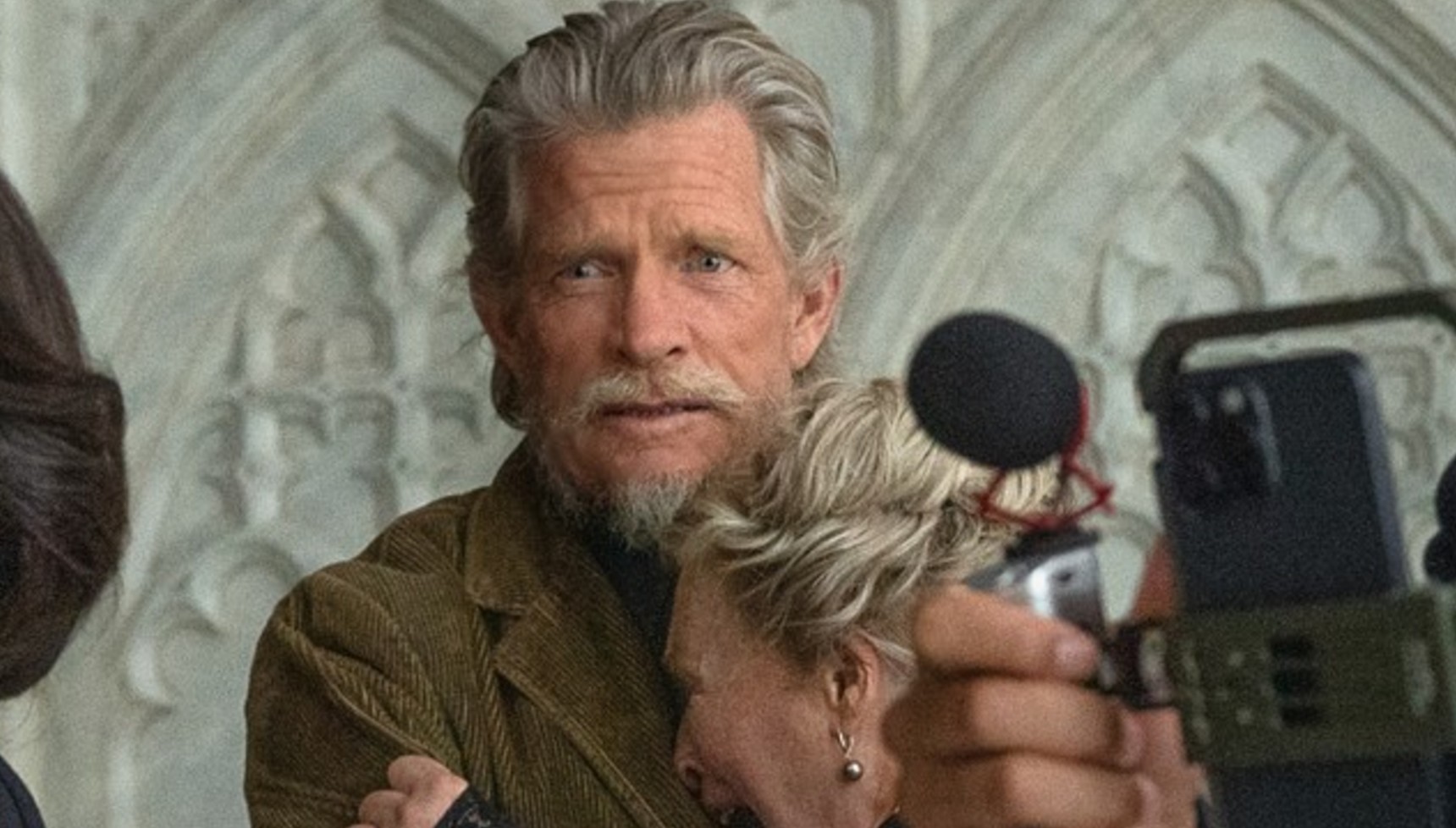 Samson hugging Martha in Wake Up Dead Man