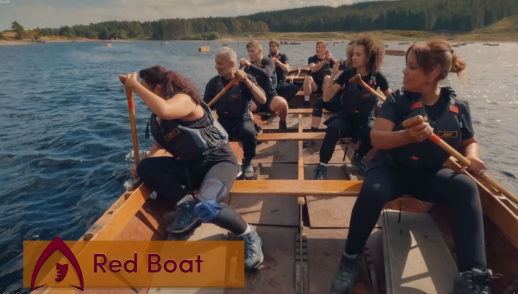 The contestants on a rowing boat 