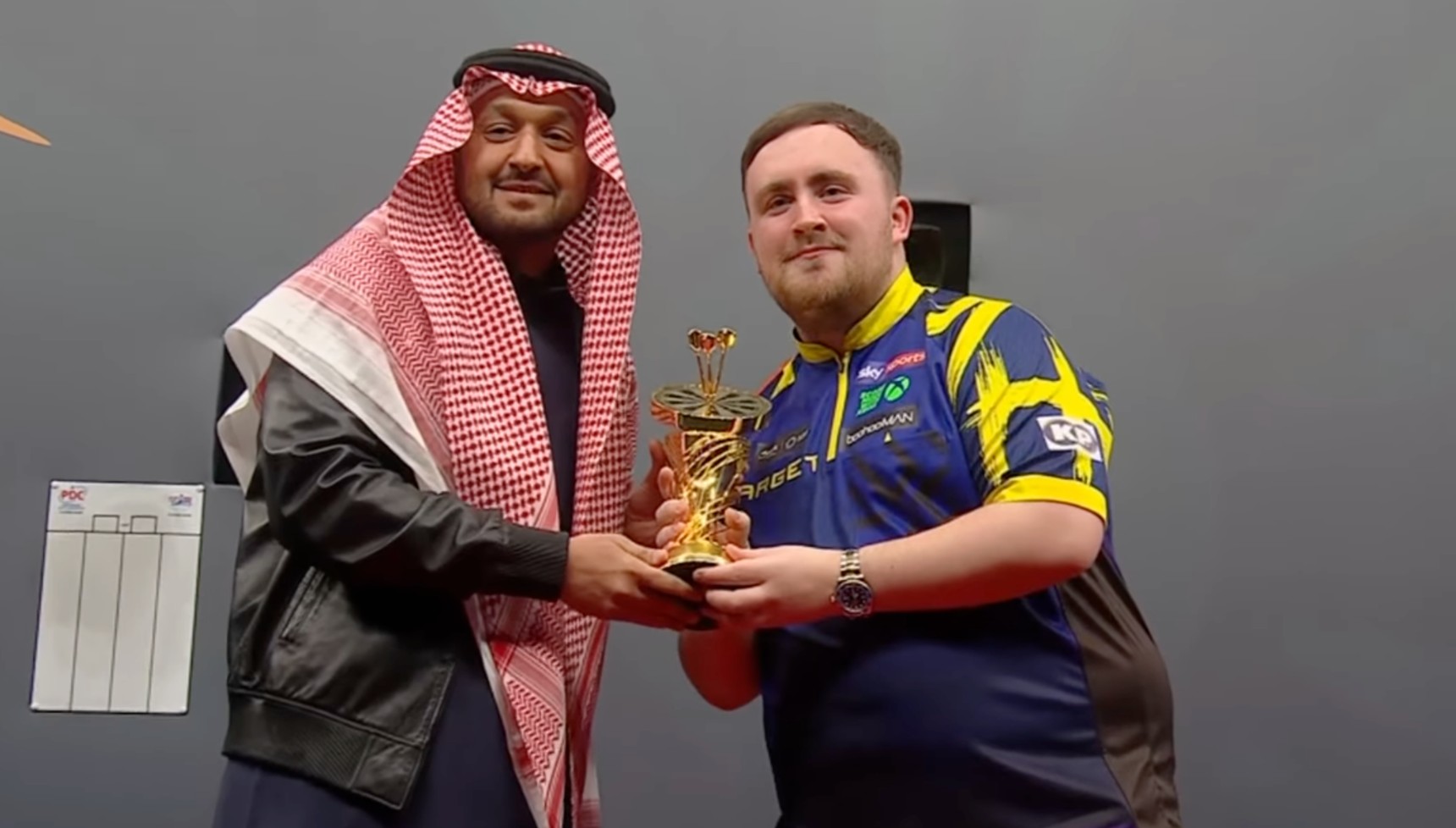 Luke Littler with his trophy from the Saudi Arabia Darts Masters