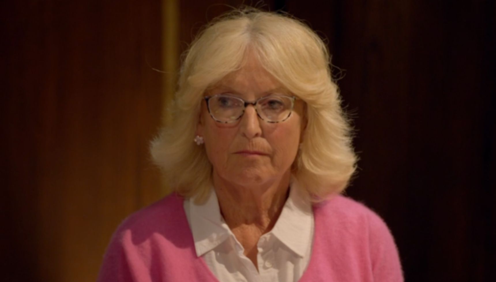 Fiona on The Traitors in pink jumper 