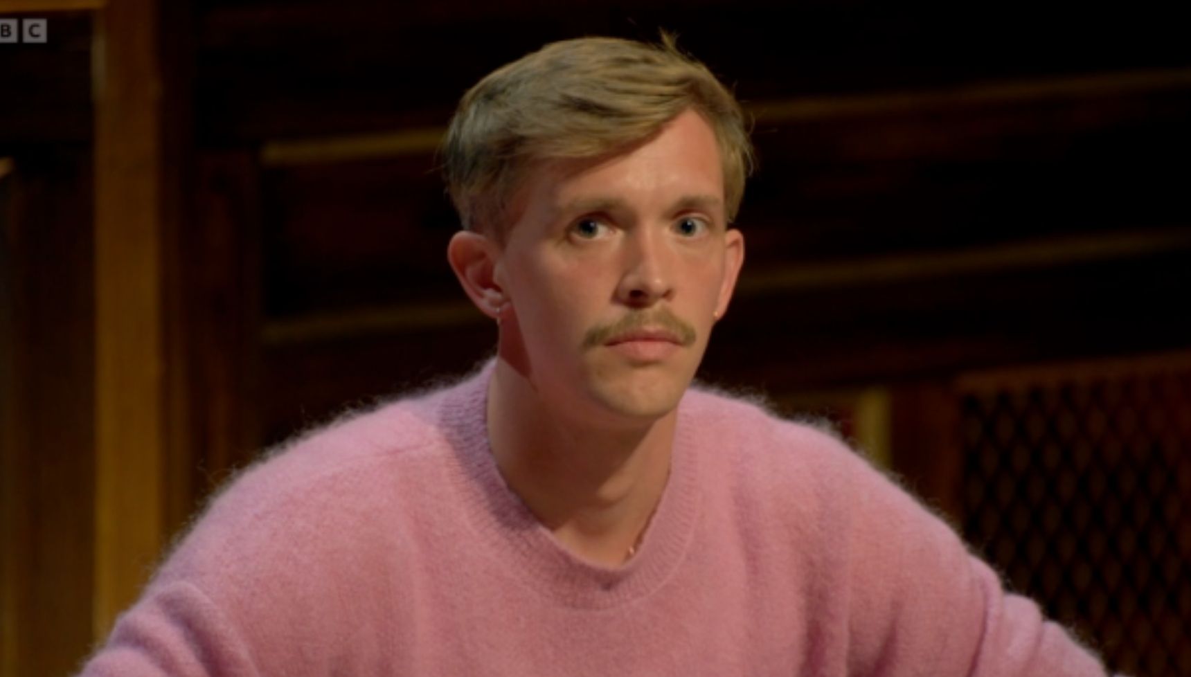 Stephen on The Traitors wearing pink 