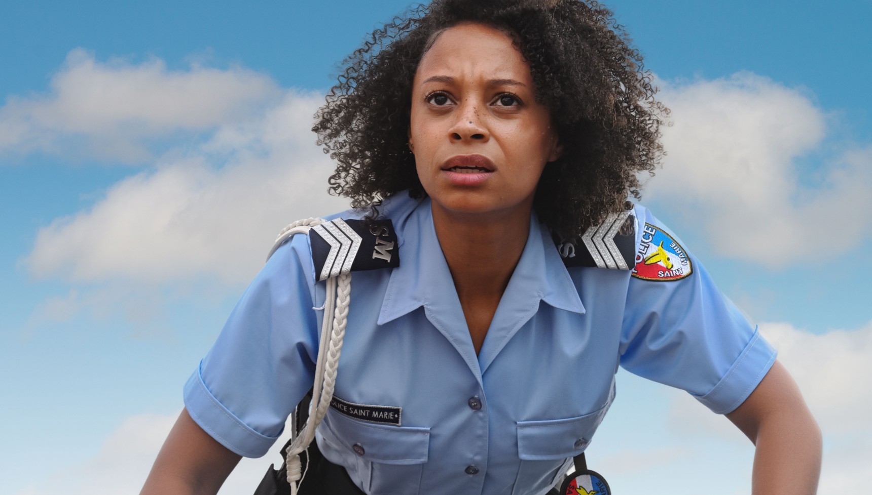 Catherine Garton as Sergeant Mattie Fletcher in Death in Paradise