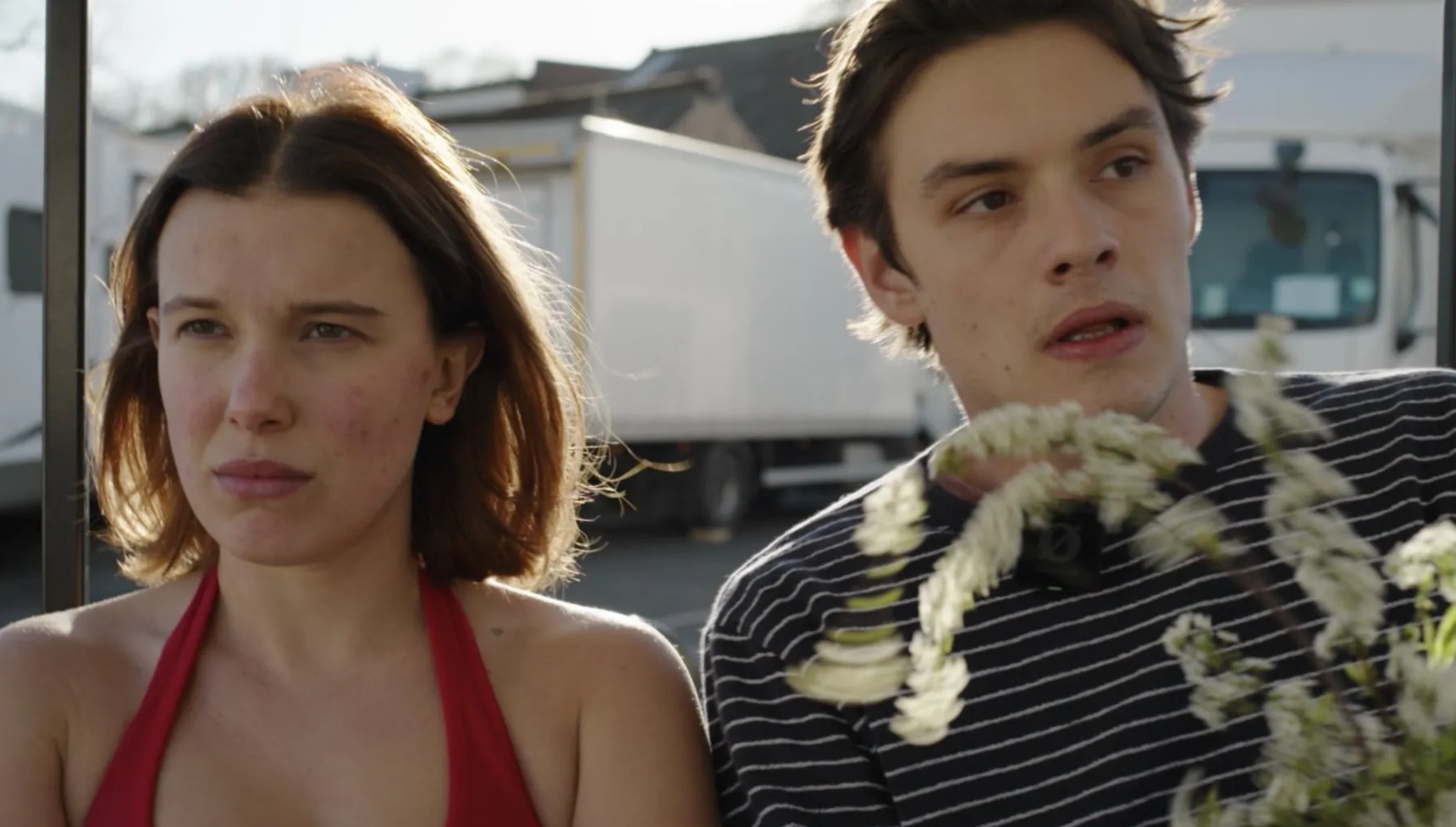 Enola Holmes and Louis Partridge in an image behind the scenes of Enola Holmes 3