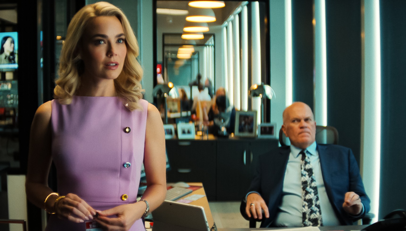 Lexy and the manager of the news station in His and Hers