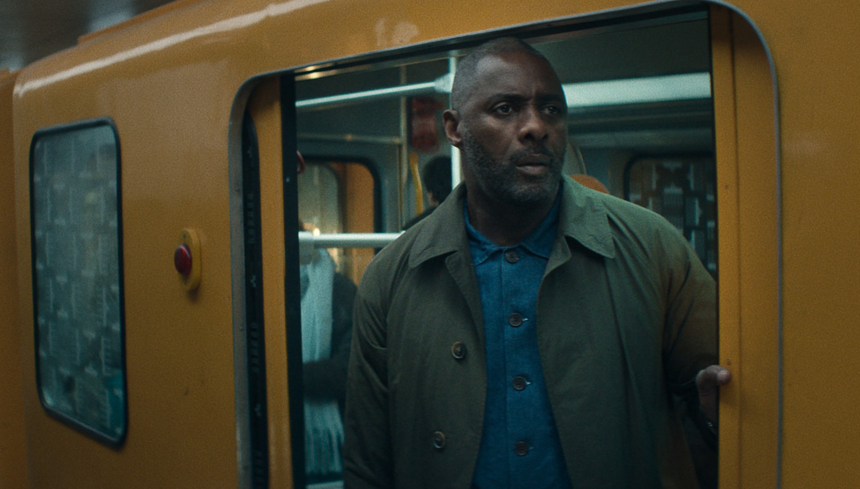 Idris Elba on a train in Hijack season 2
