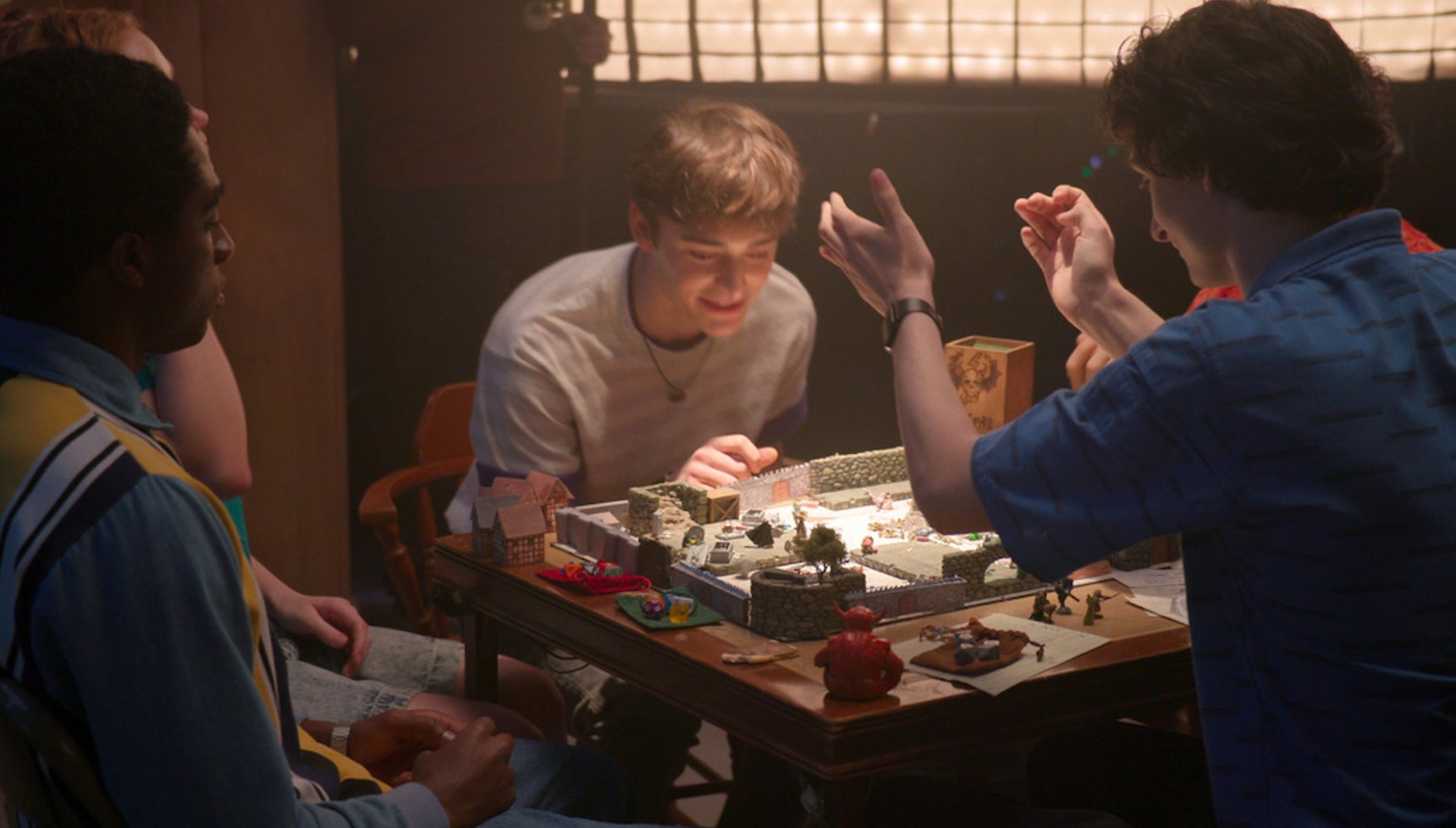 Will, Lucas, and Mike playing Dungeons and Dragons in the Stranger Things documentary