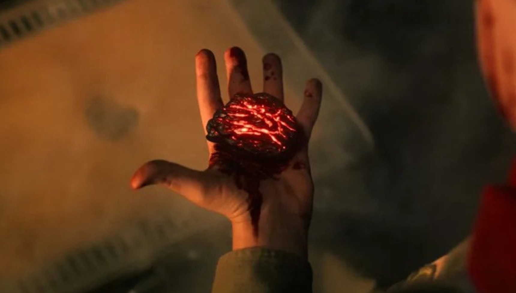 Henry Creel's hand holding a rock in the Stranger Things season 5 finale