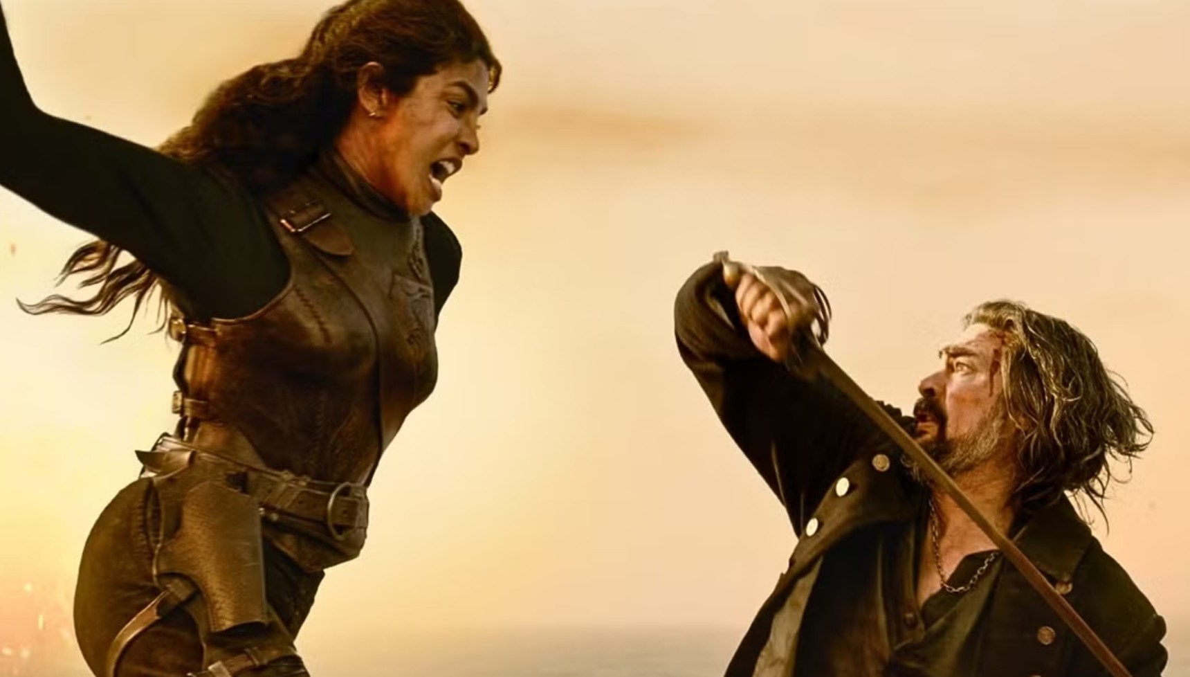 Priyanka Chopra and Karl Urban fighting with swords in The Bluff