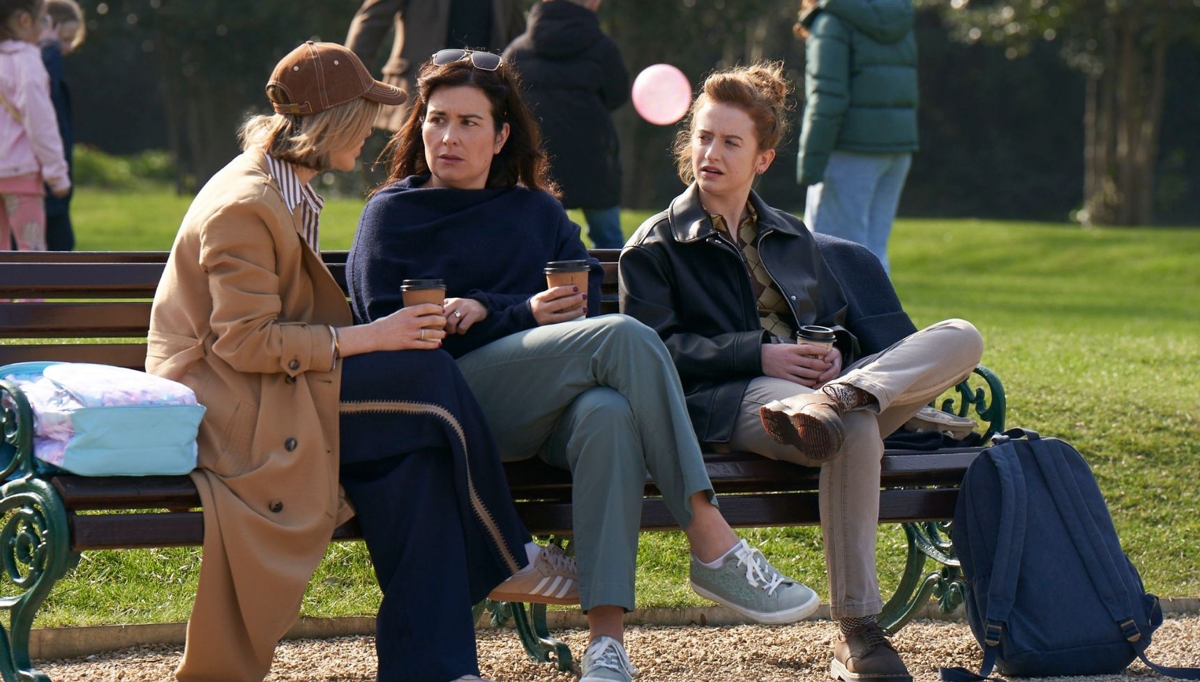 Claire, Maggie and Helen have a coffee in a park in The Walsh Sisters 