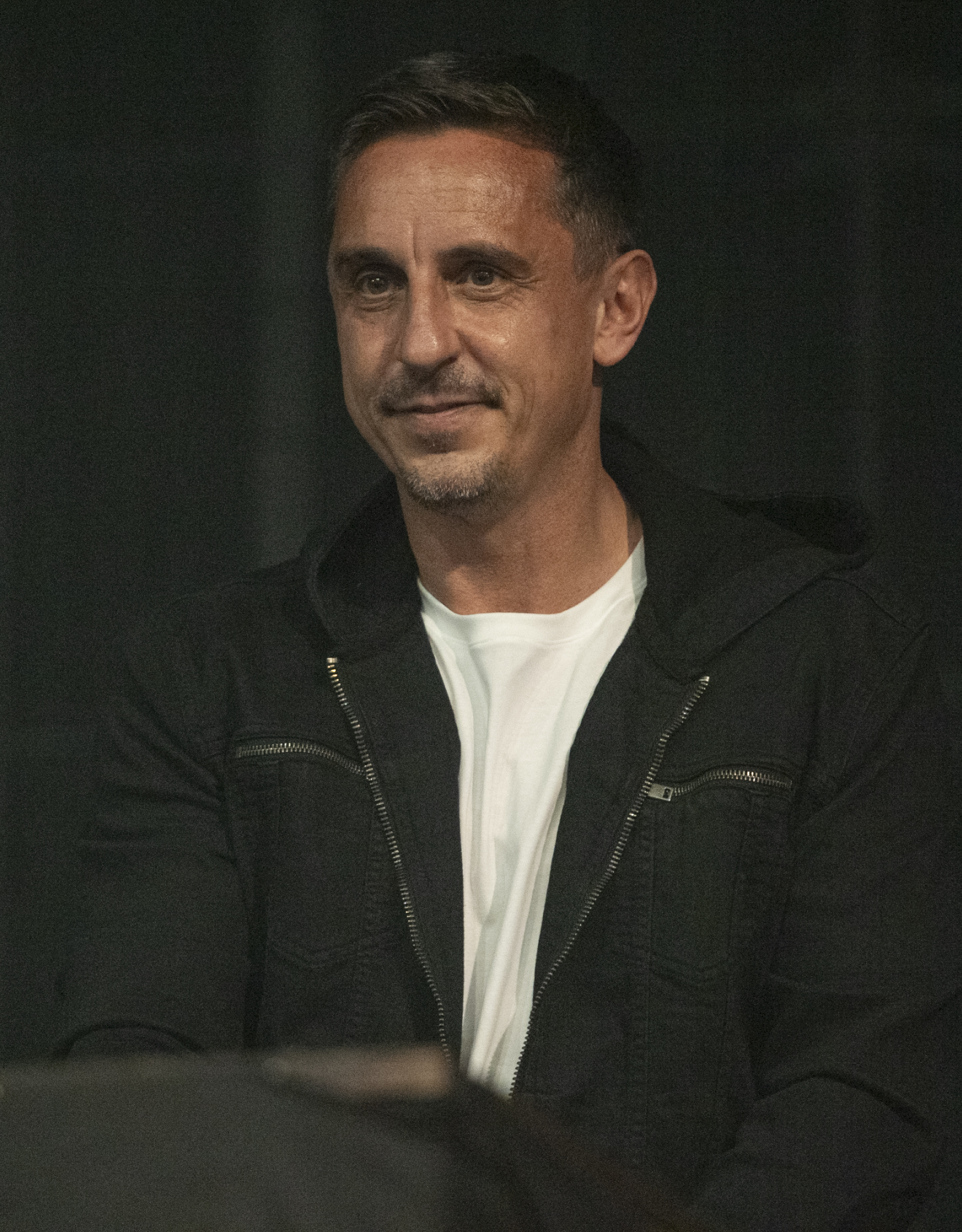 Gary Neville smiling at event