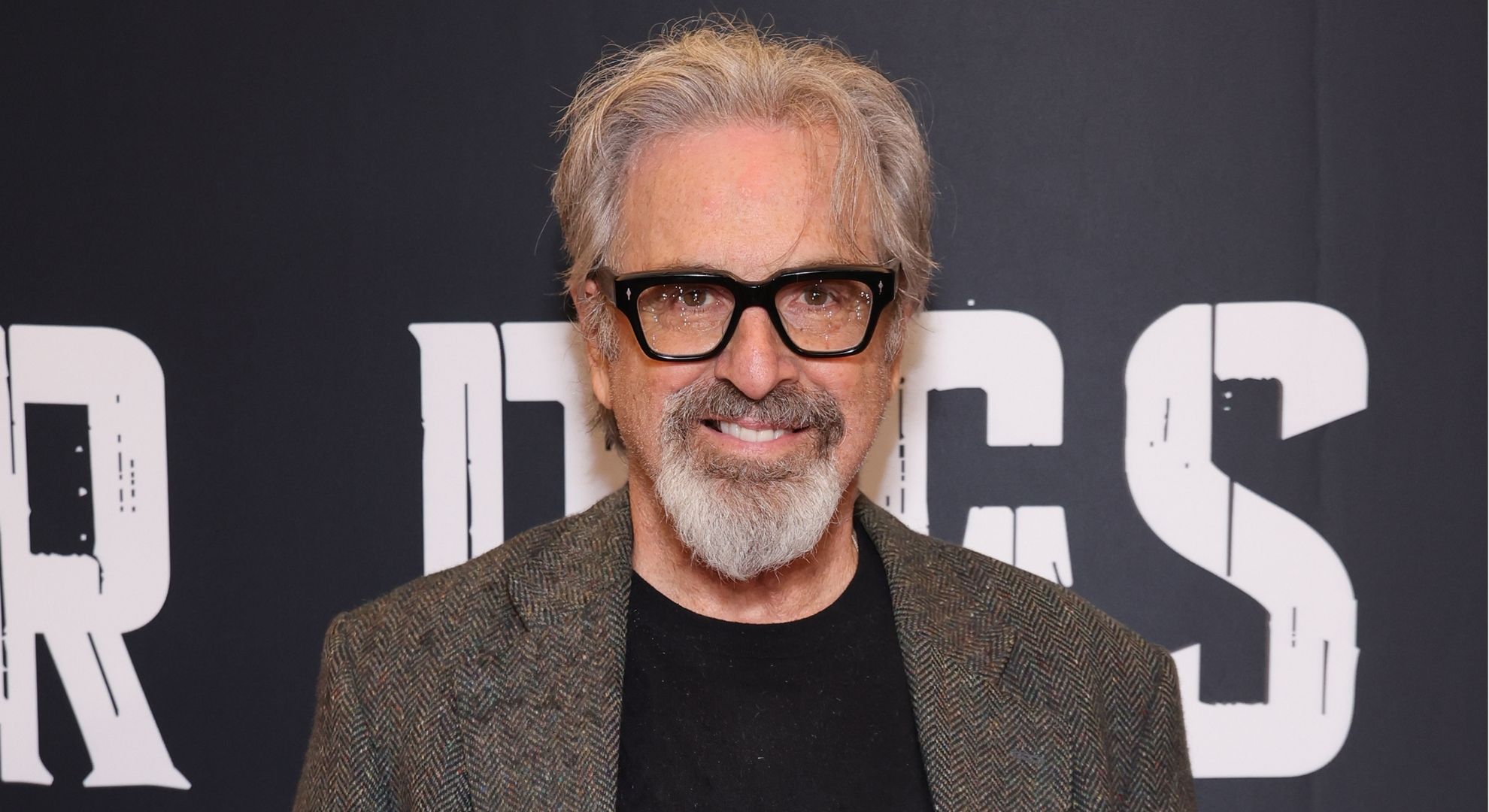 Robert Carradine smiling