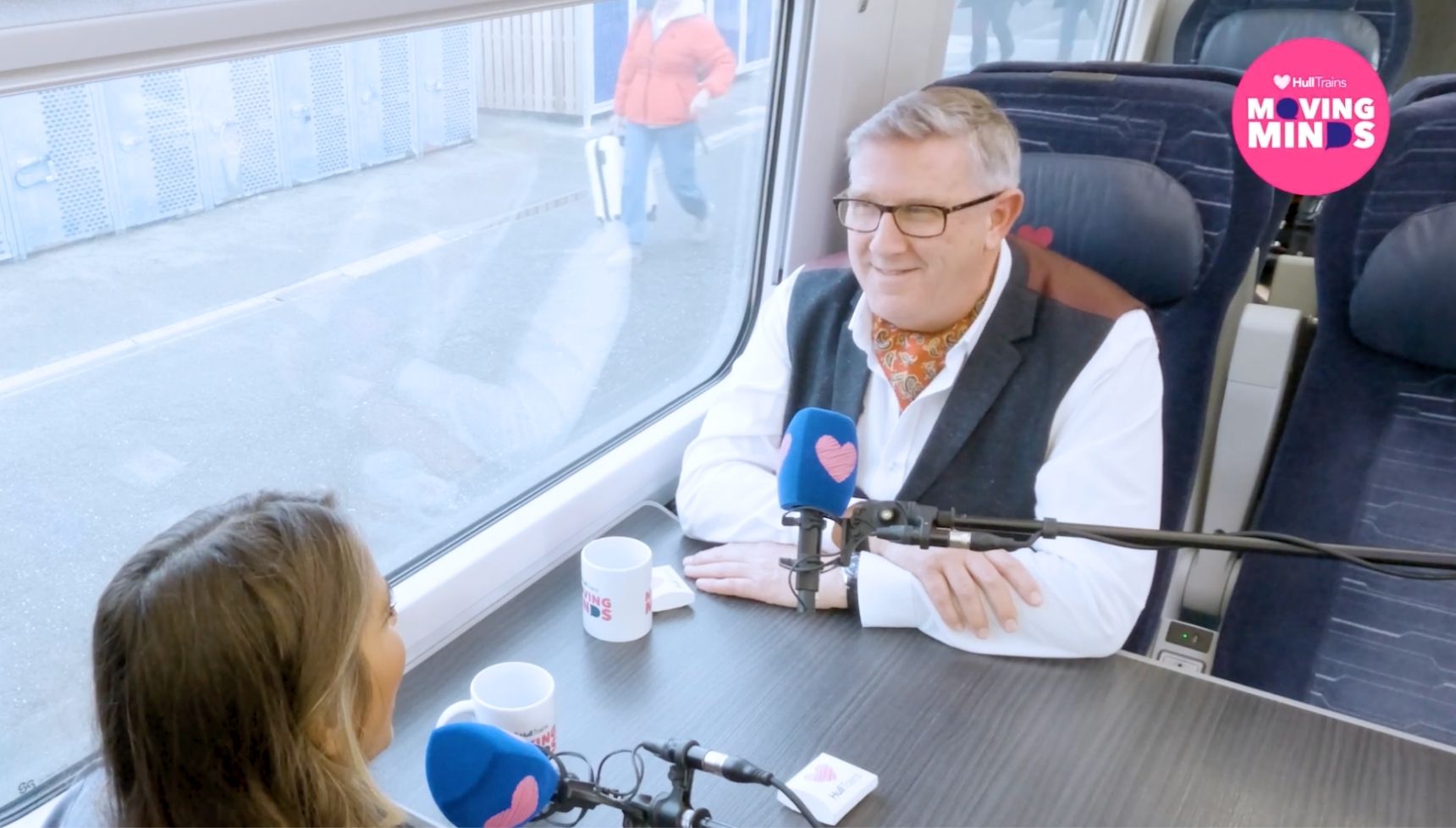 gemma oaten, graeme hall on a train