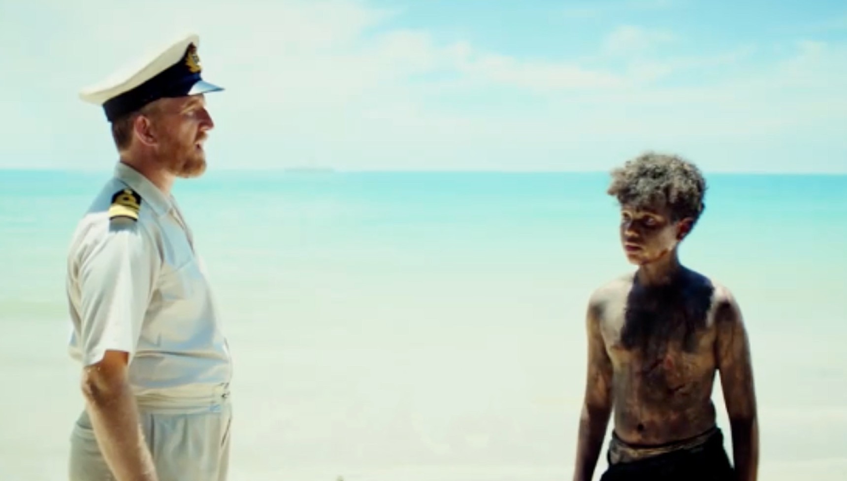 The naval officer and Ralph in Lord of the Flies