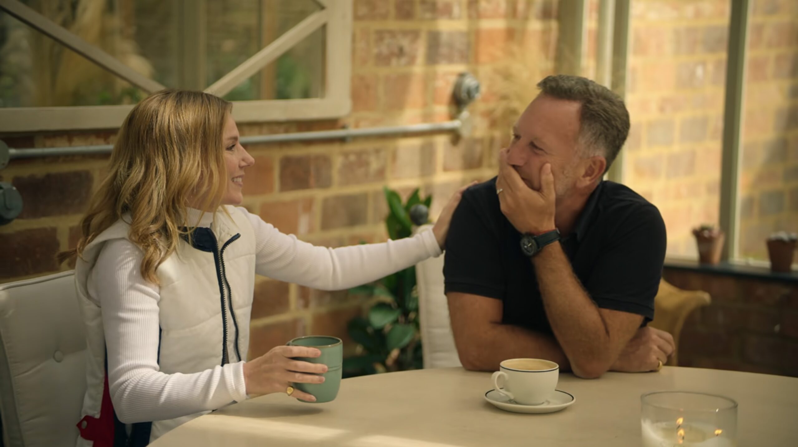 Geri Halliwell touching Christian Horner's shoulder 