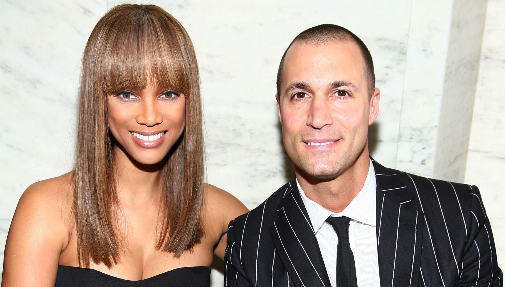 Tyra Banks and Nigel Barker smiling