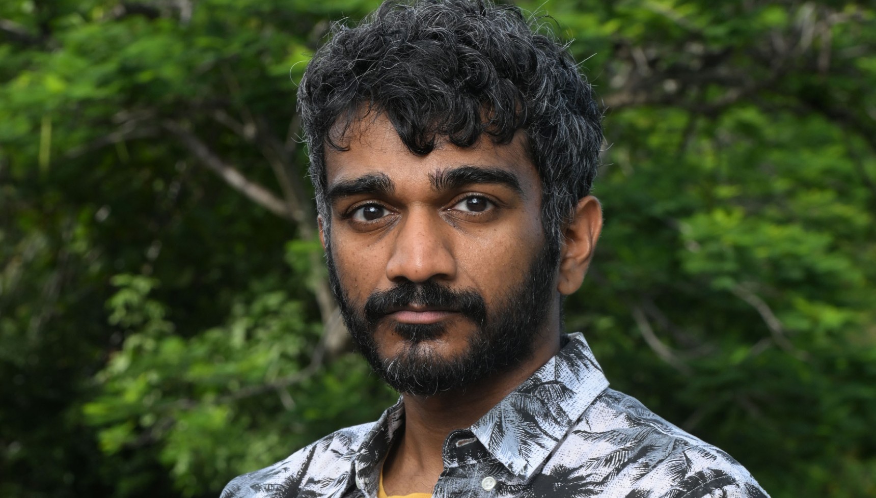 Paul G Raymond portrays Nathan Burns in Death in Paradise