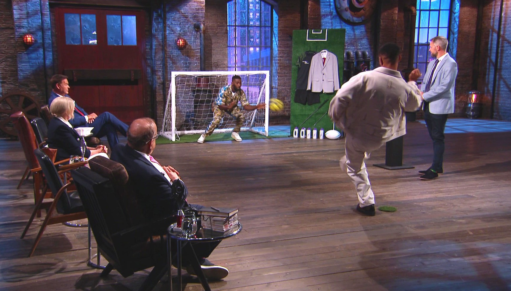Steven Bartlett kicks a ball at Tinie Tempah