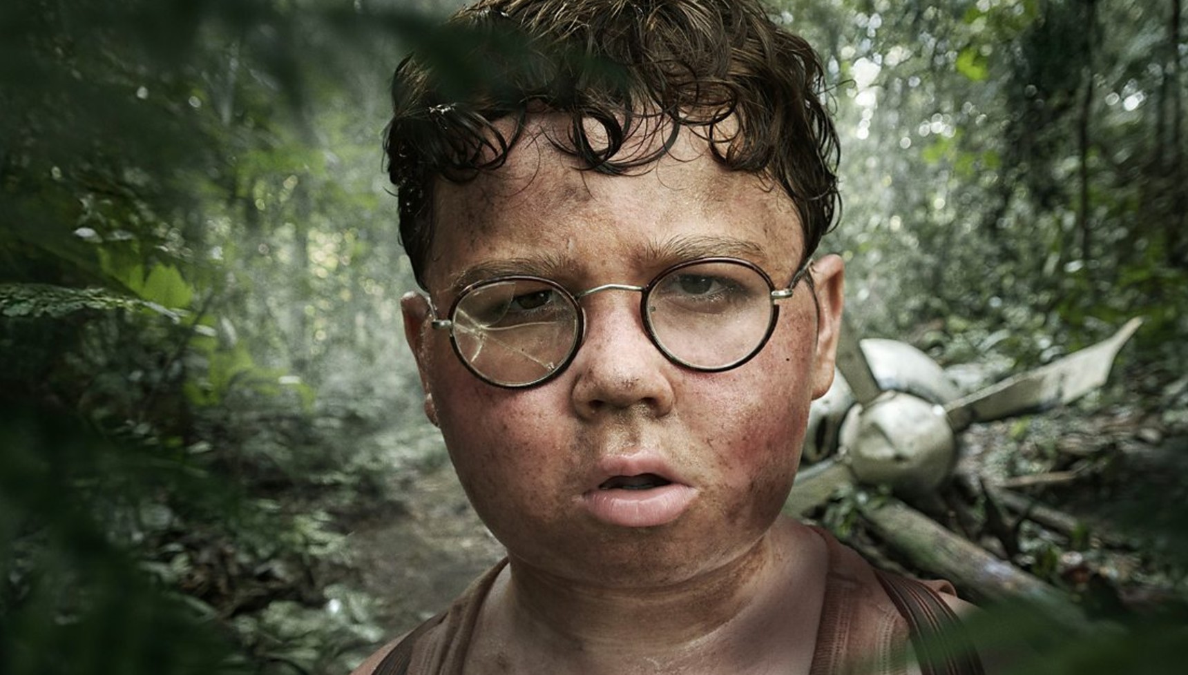 piggy wearing cracked glasses in Lord of the Flies