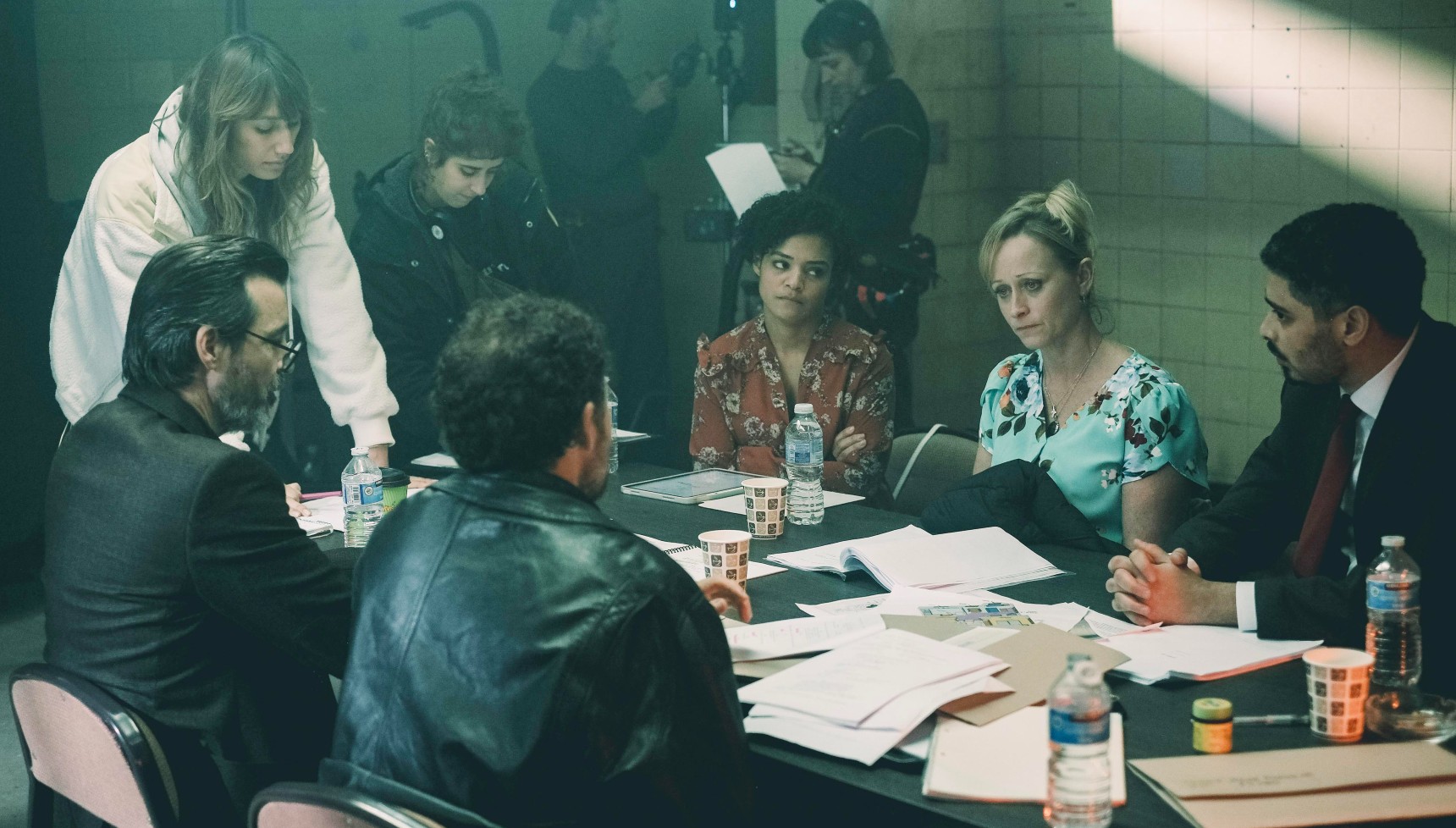 The cast of Under Suspicion: Kate McCann sitting at a table