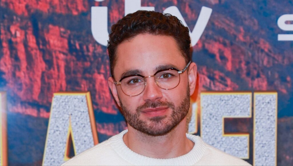 Adam Thomas posing 