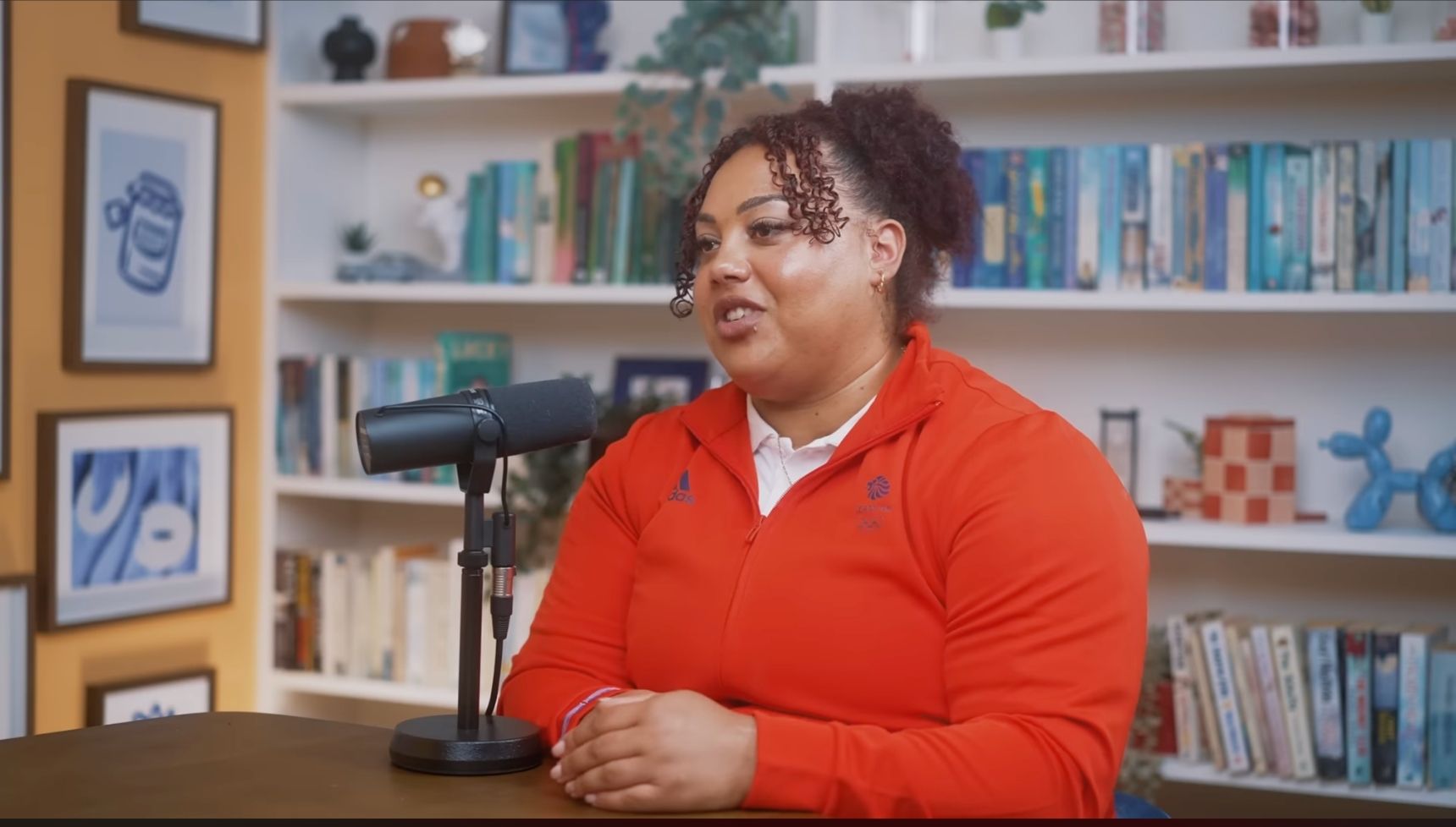 Emily Campbell on a podcast