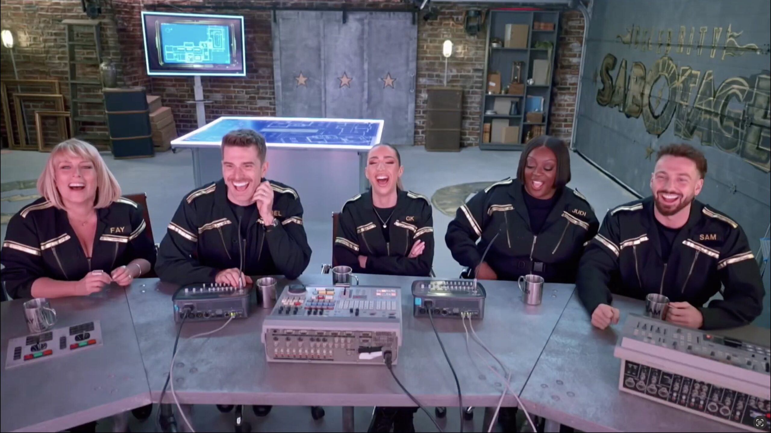 Celebrity Sabotage cast in headquarters office