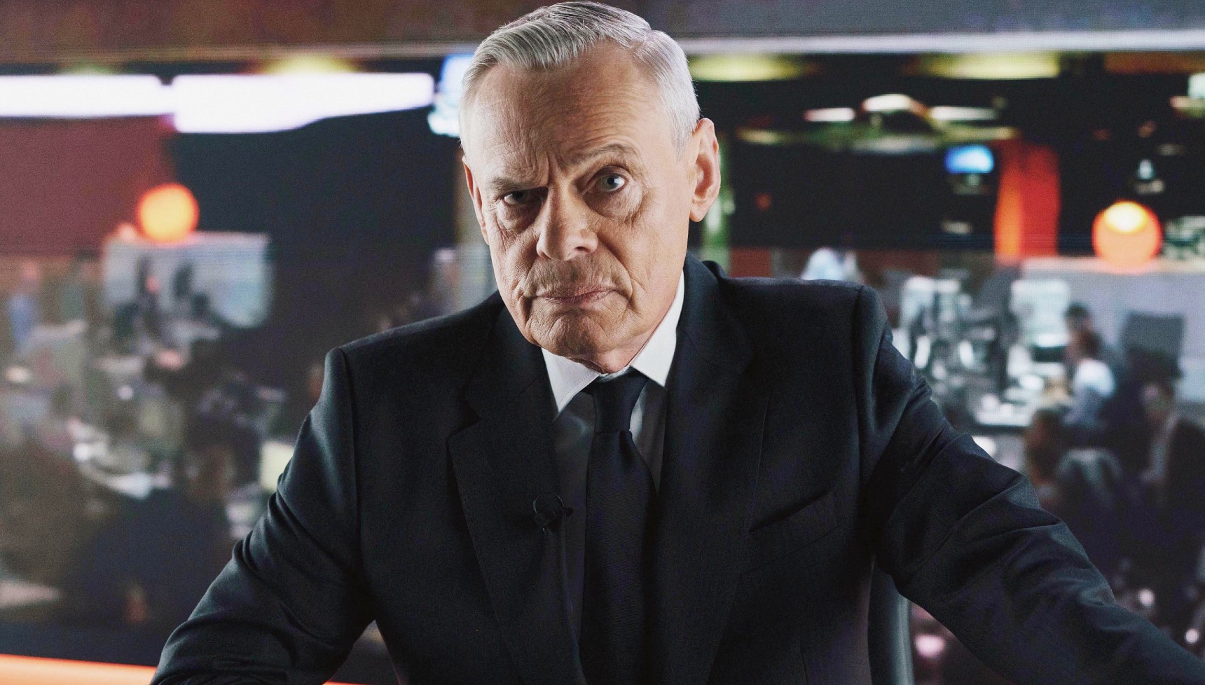 Martin Clunes as Huw Edwards