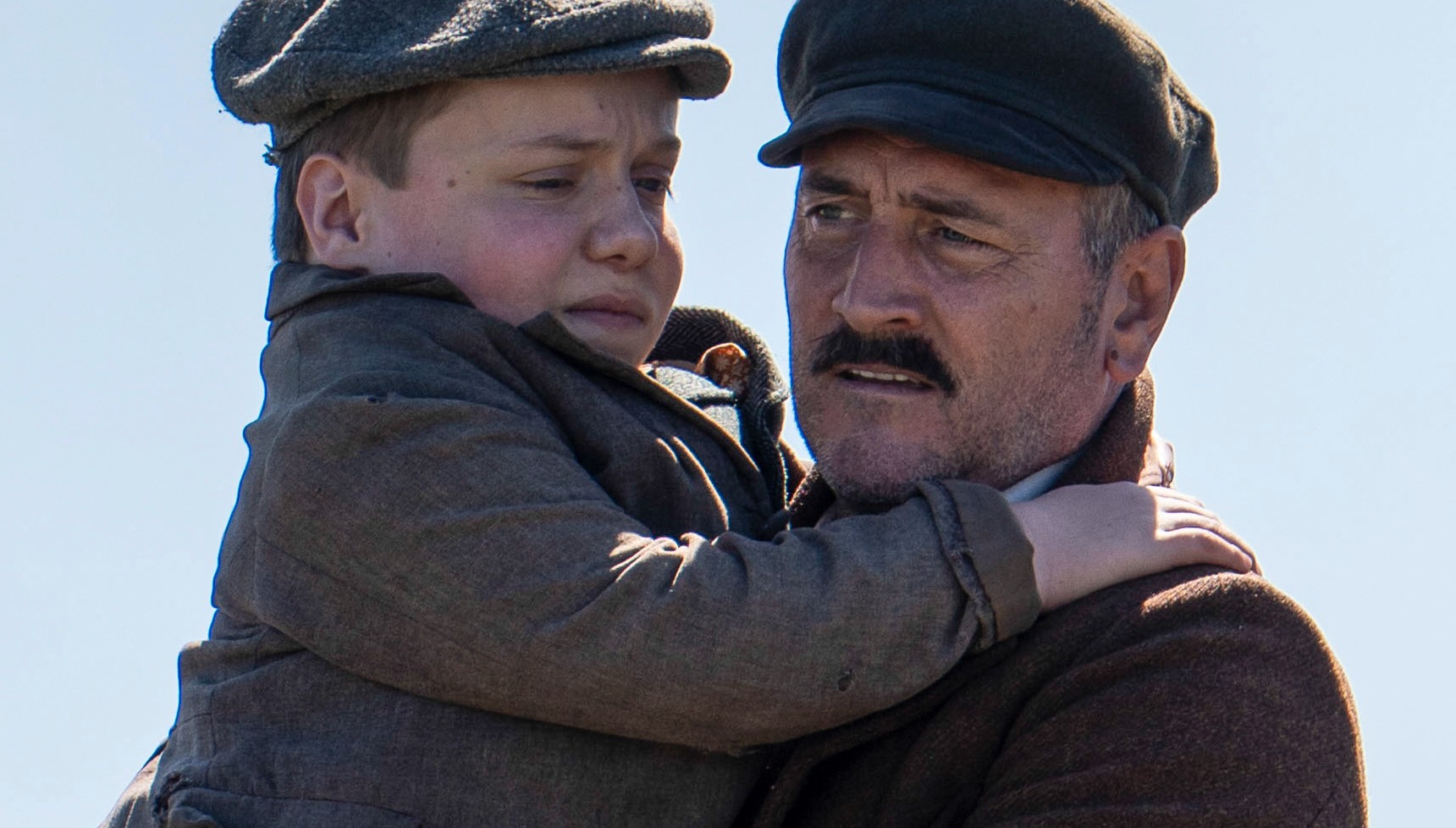 Will Mellor carrying Lenny Rush in A Woman of Substance