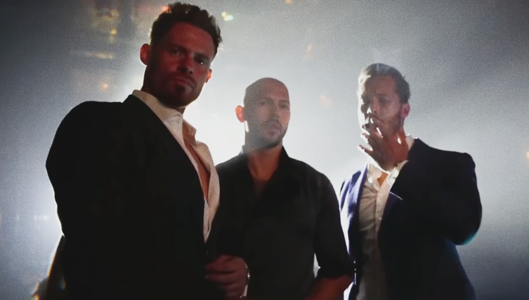 Justin Waller standing next to Andrew Tate and Tristan Tate in Louis Theroux: Inside the Manosphere