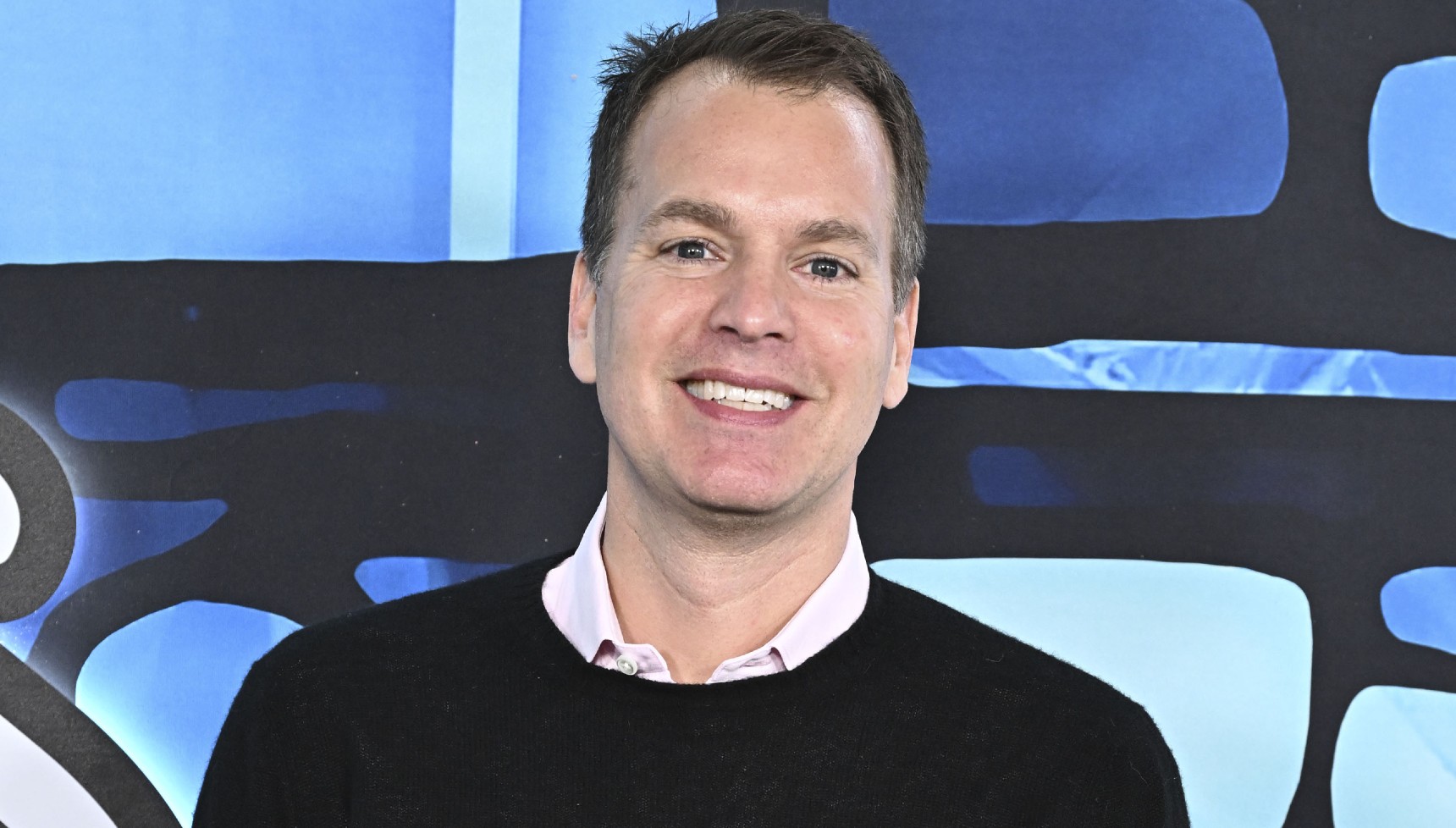 Casey Bloys smiling at an event