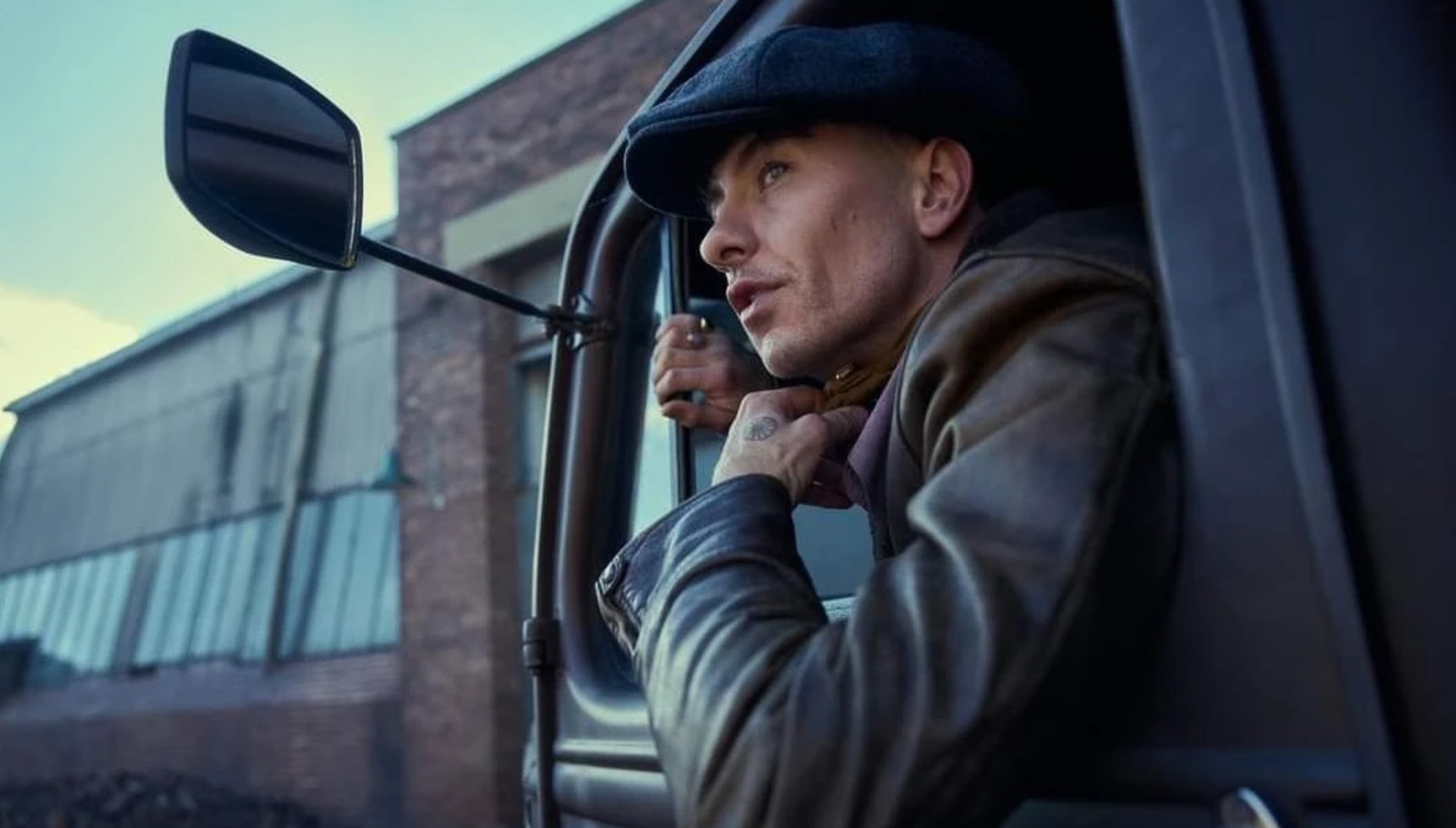 Barry Keoghan's Duke hanging out of a car in Peaky Blinders: The Immortal Man