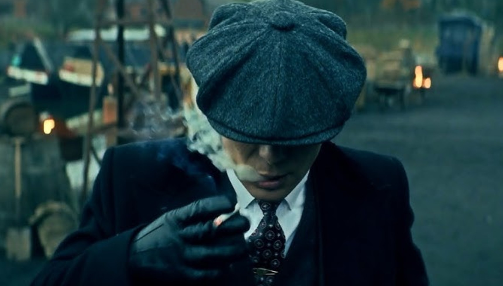 Tommy Shelby smoking a cigarette in Peaky Blinders