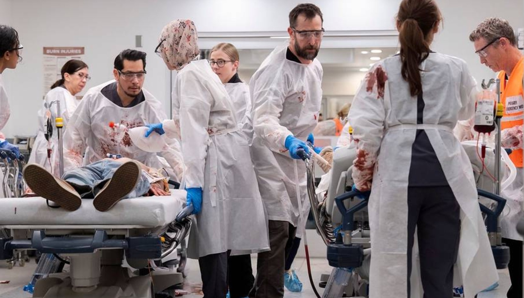 The doctors in The Pitt after the shooting