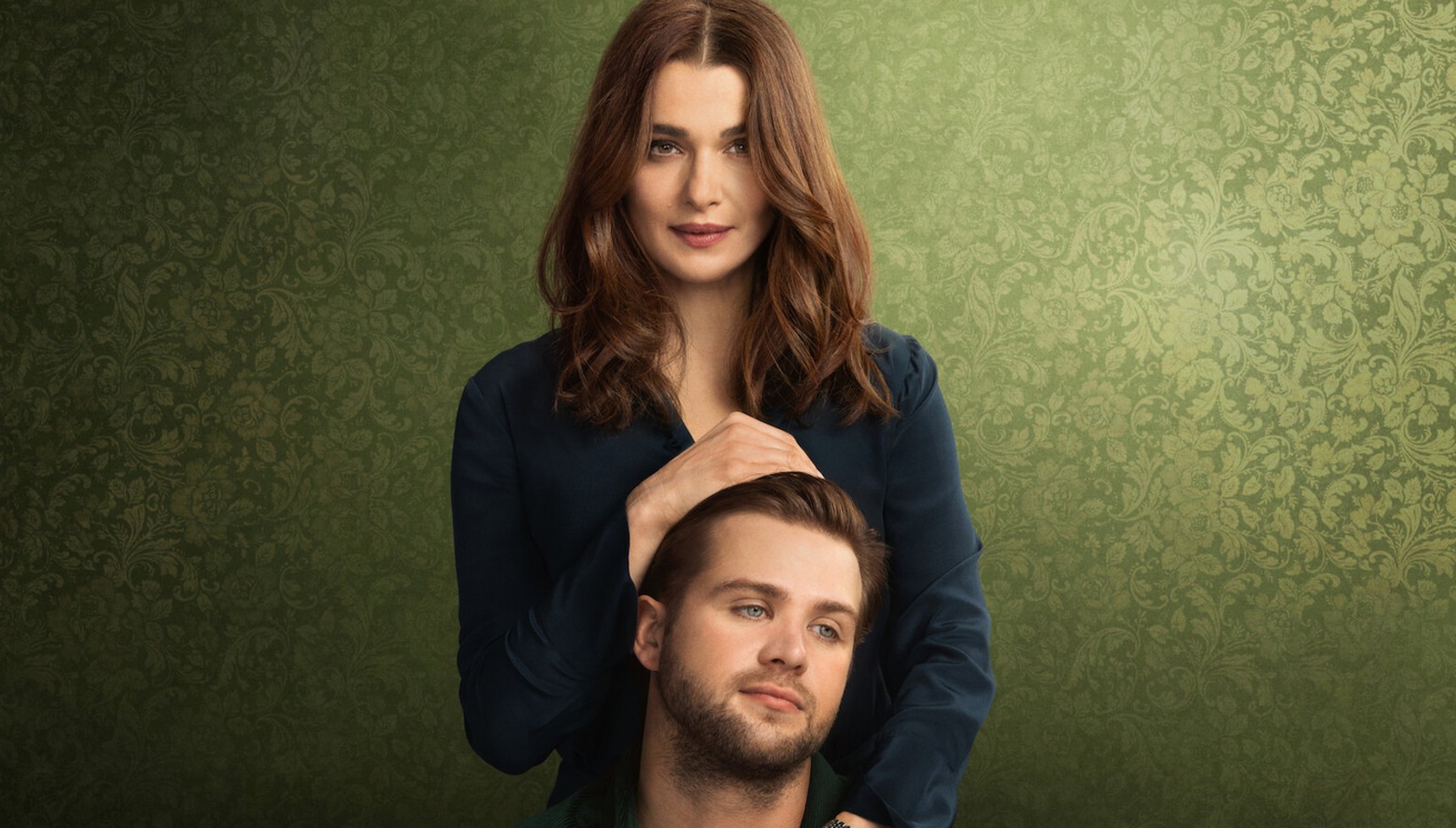 Rachel Weisz holding Leo Woodall's head in a poster for Vladimir