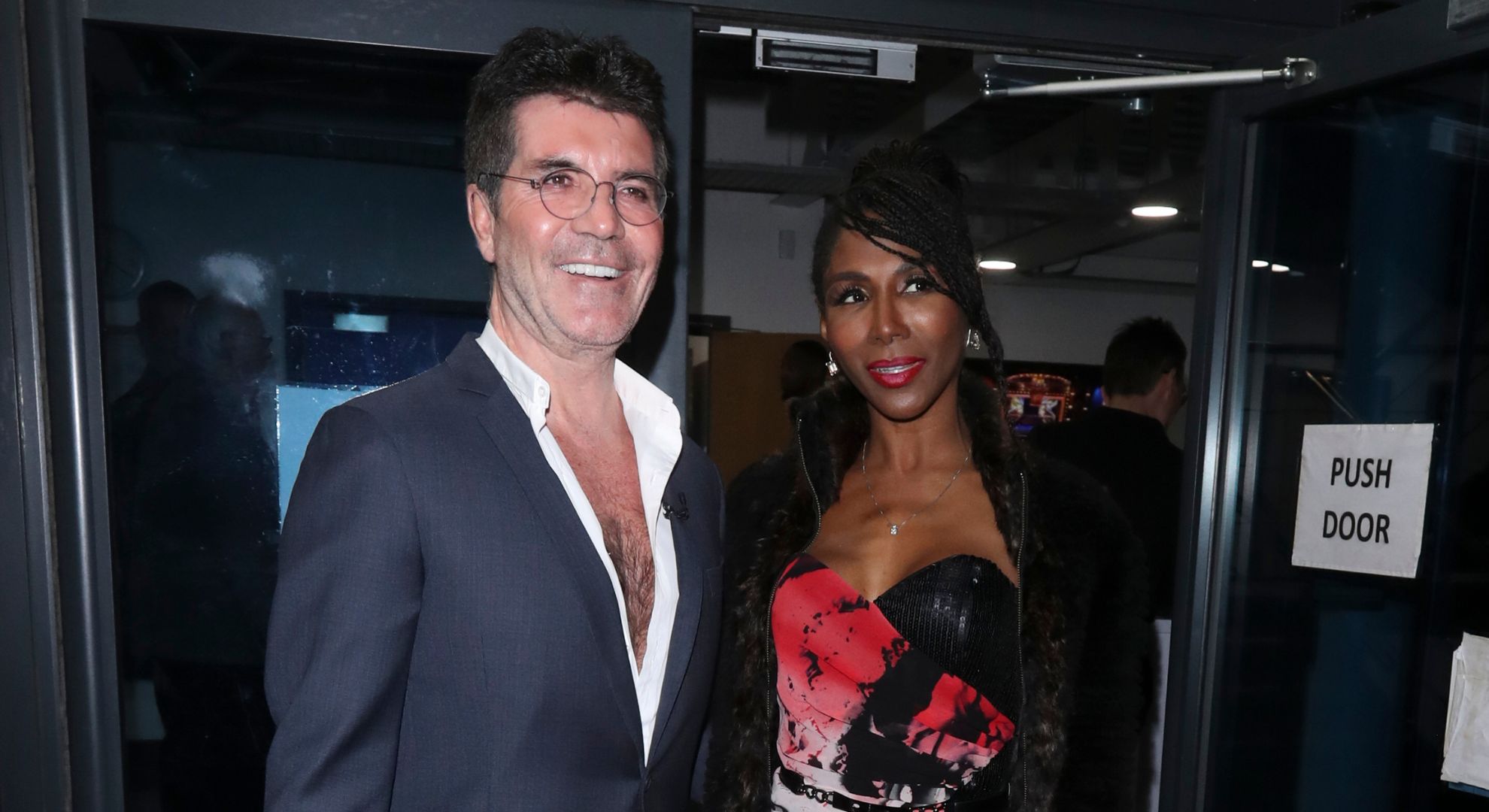 Simon Cowell and Sinitta smiling