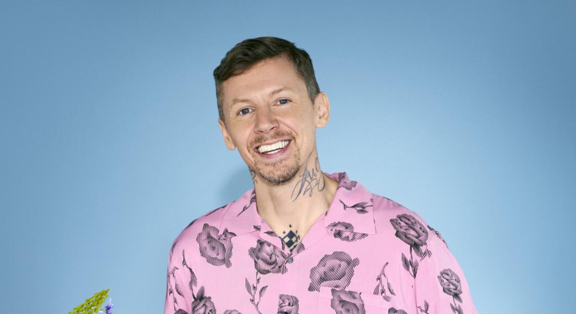 Professor Green smiling