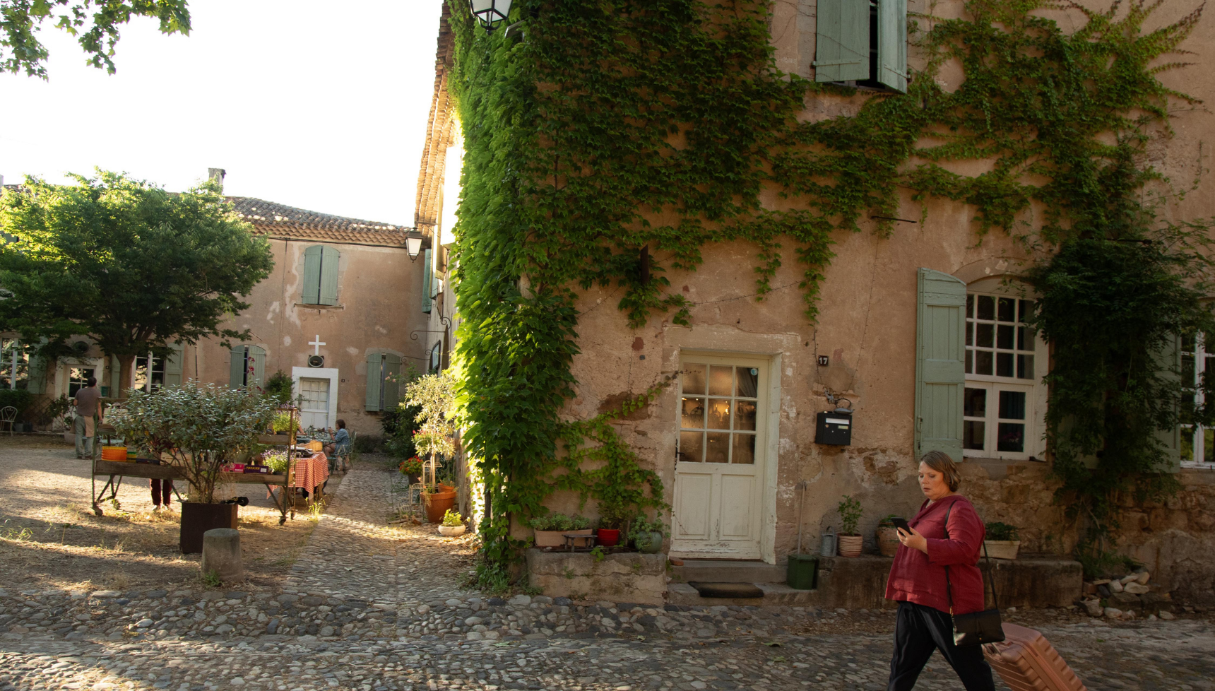 Joanna Scanlan walking through Saint-Michel in Missed Call