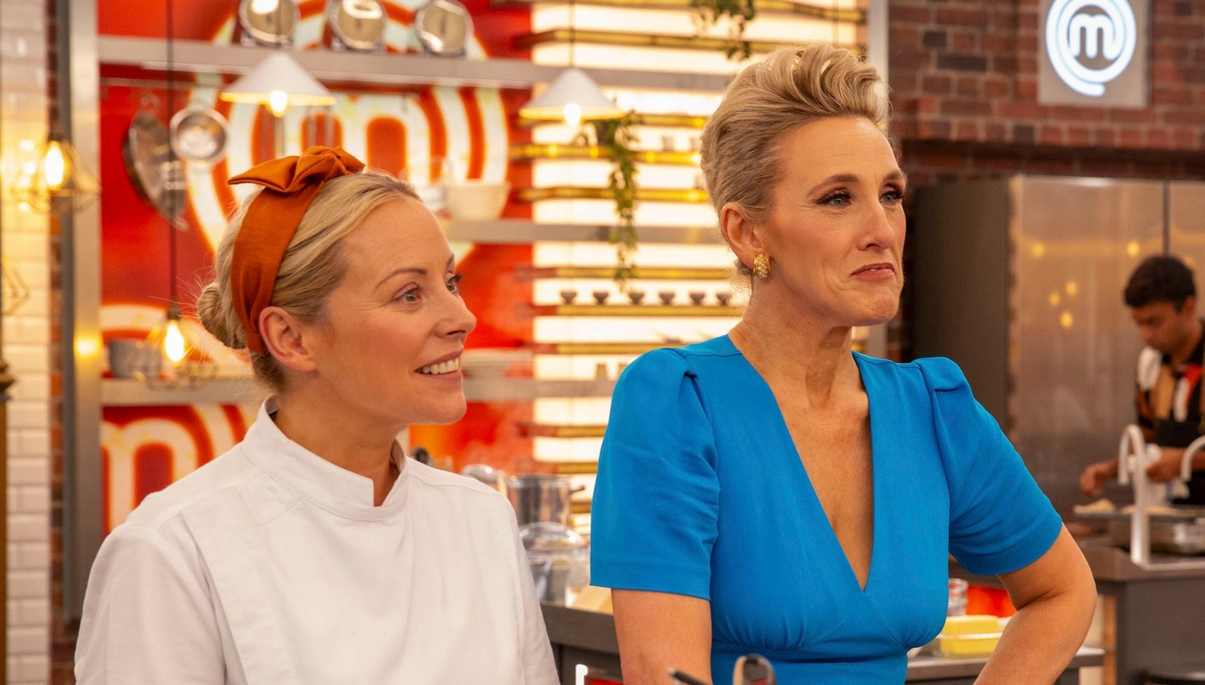 MasterChef's Anna in chef's overalls and Grace in blue dress