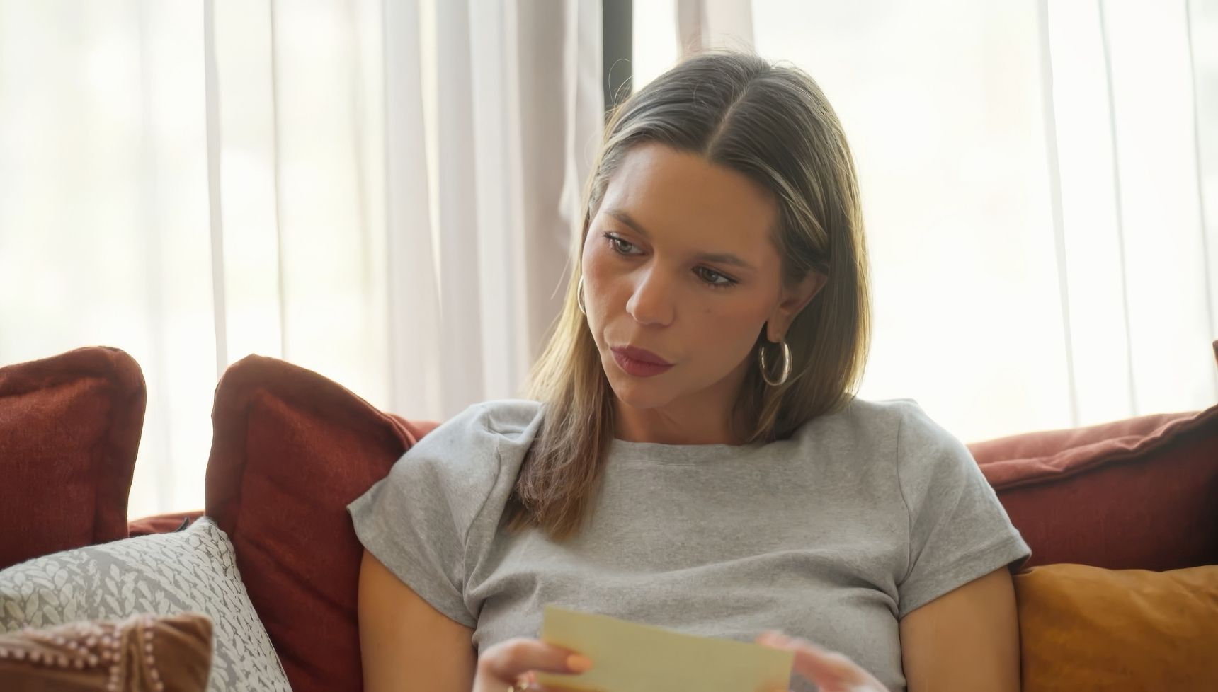 Bec sitting on sofa in MAFS Australia