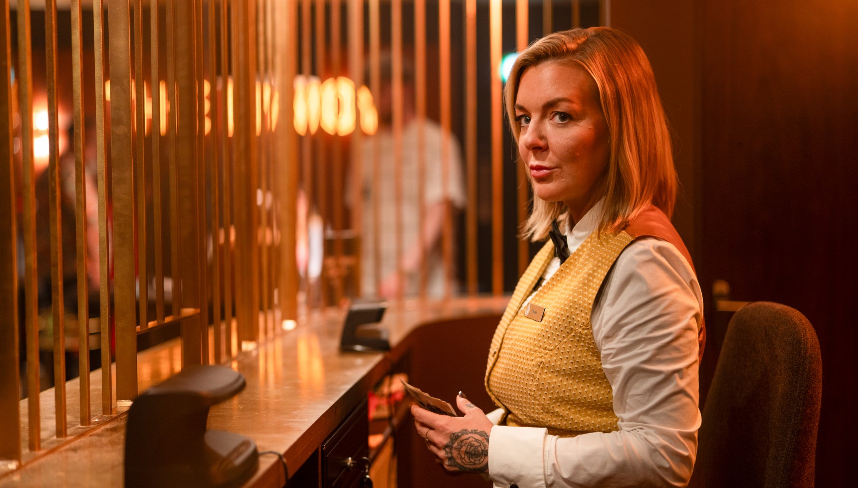Sheridan Smith character Leanne working behind The Cage