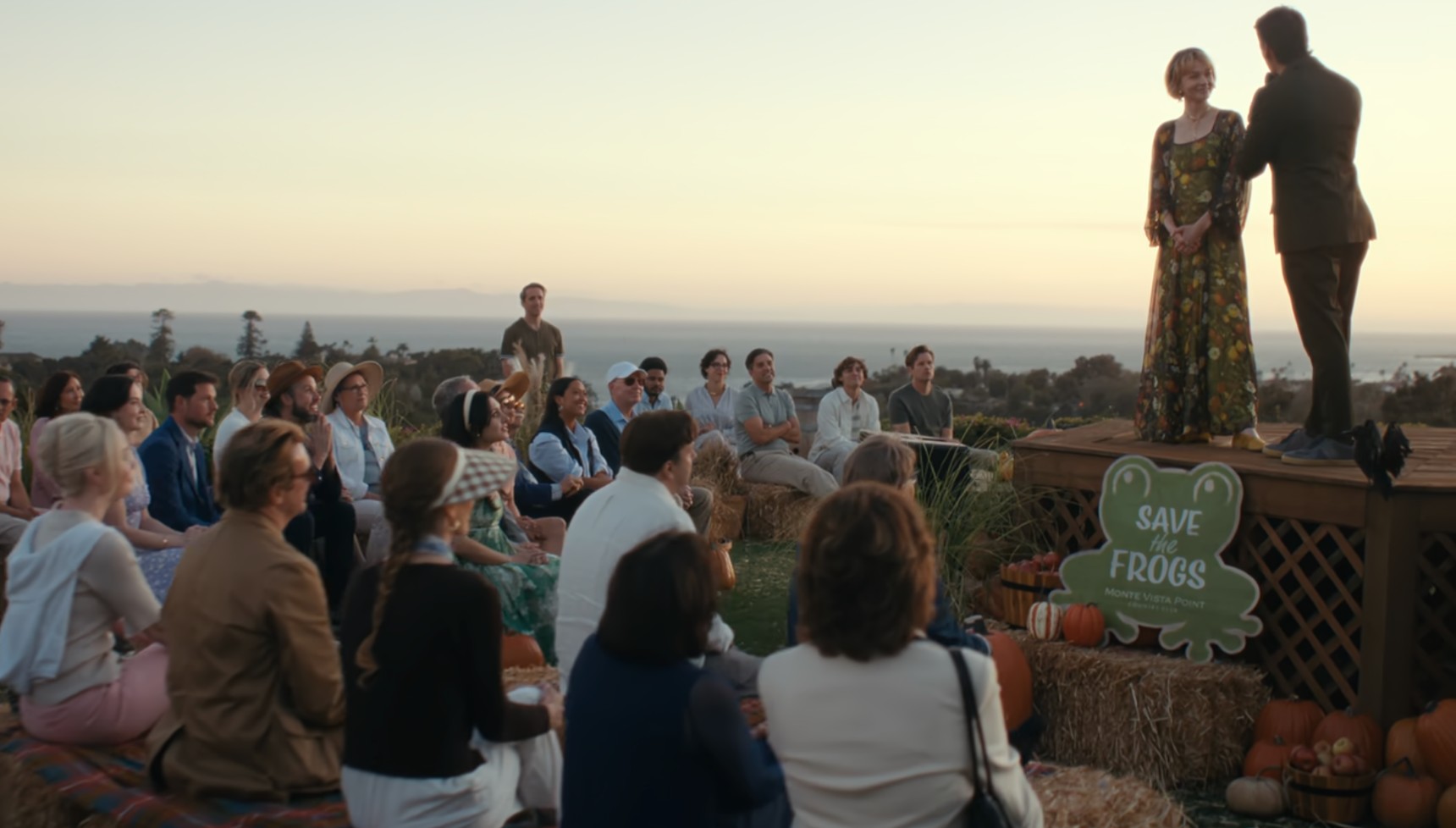 Carey Mulligan and Oscar Isaac standing in front of a crowd in Beef season 2