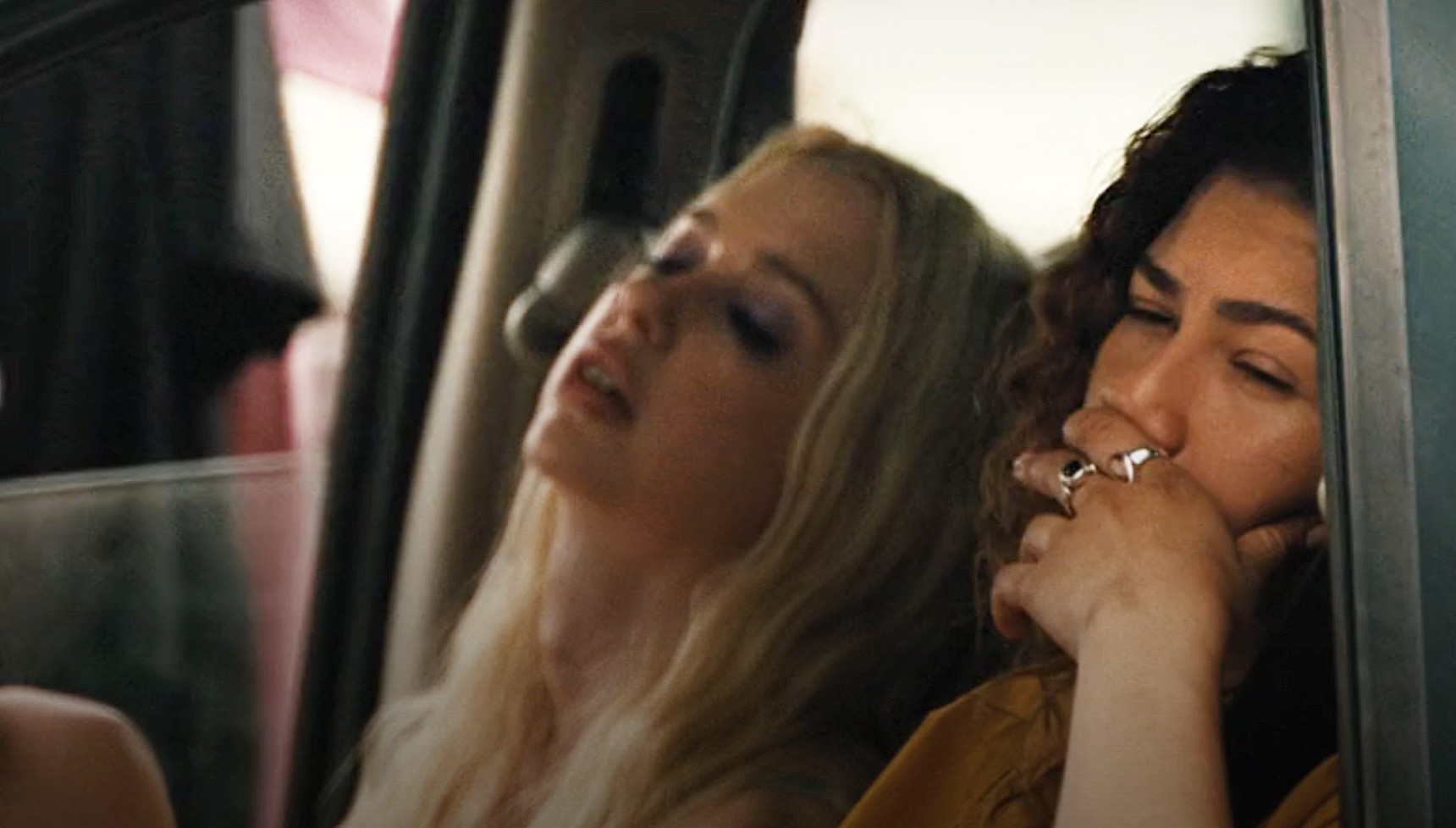 Chloe Cherry and Zendaya sitting in a car in Euphoria season 3 episode 1