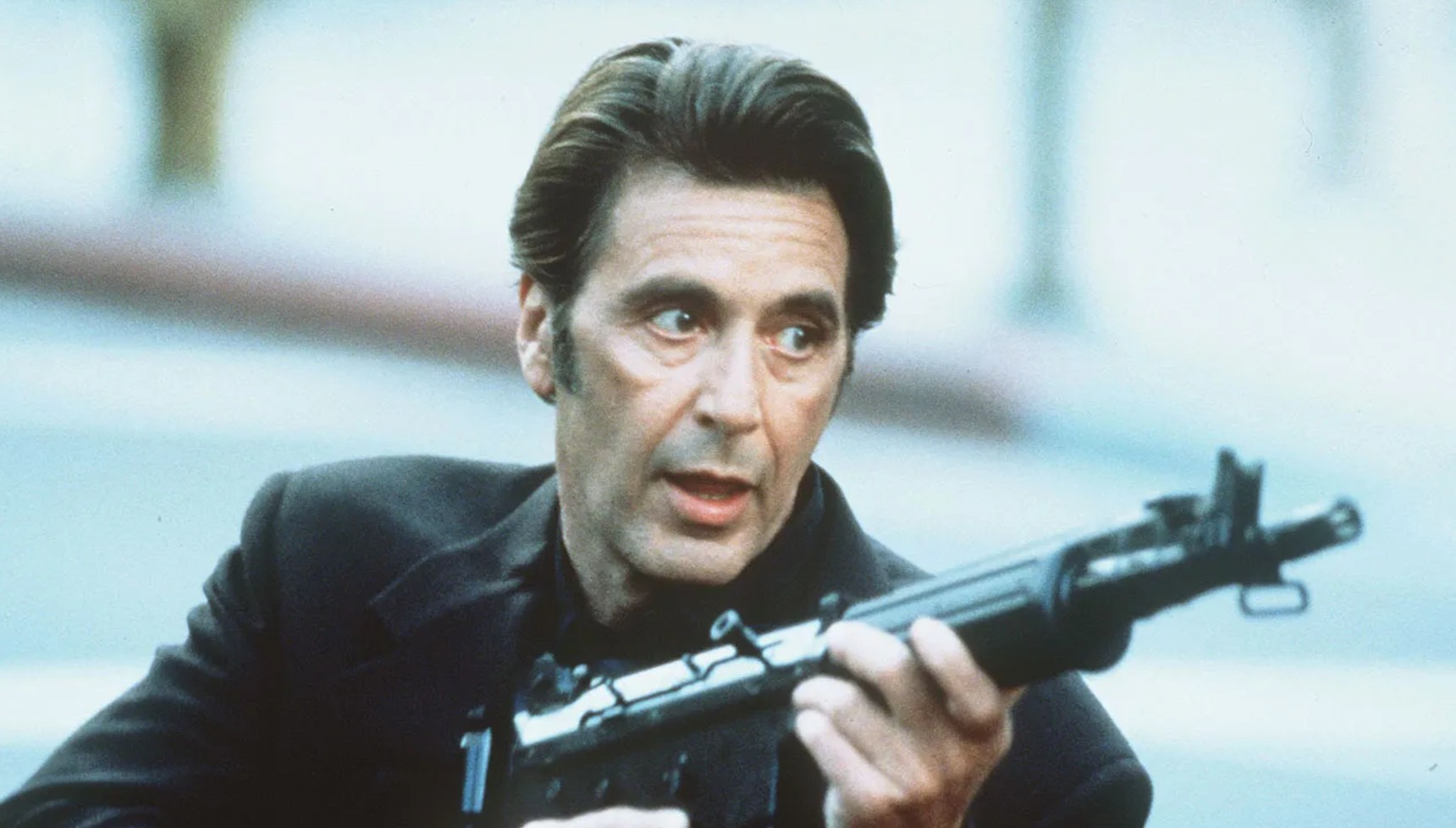Al Pacino holding a gun in Heat