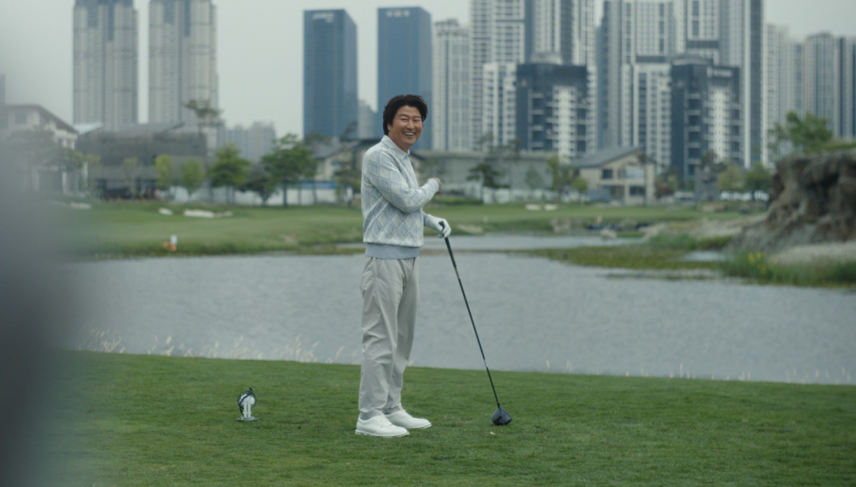 Song Kang-ho playing golf in Beef season 2