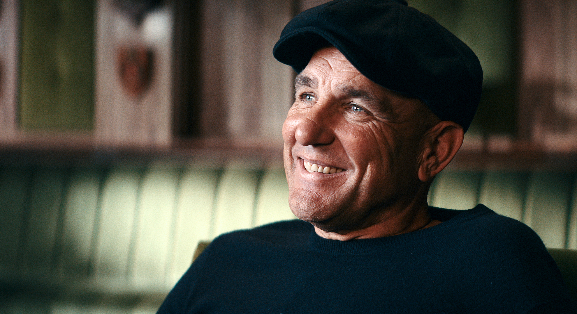 Vinnie Jones smiles in the Netflix documentary Untold UK