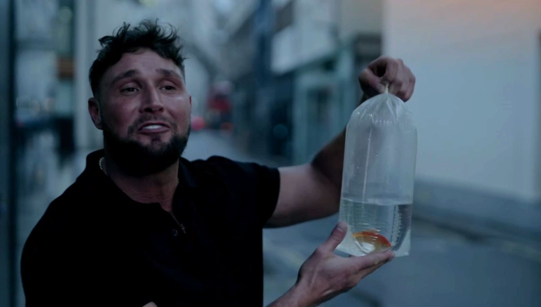 Johnny holding a goldfish