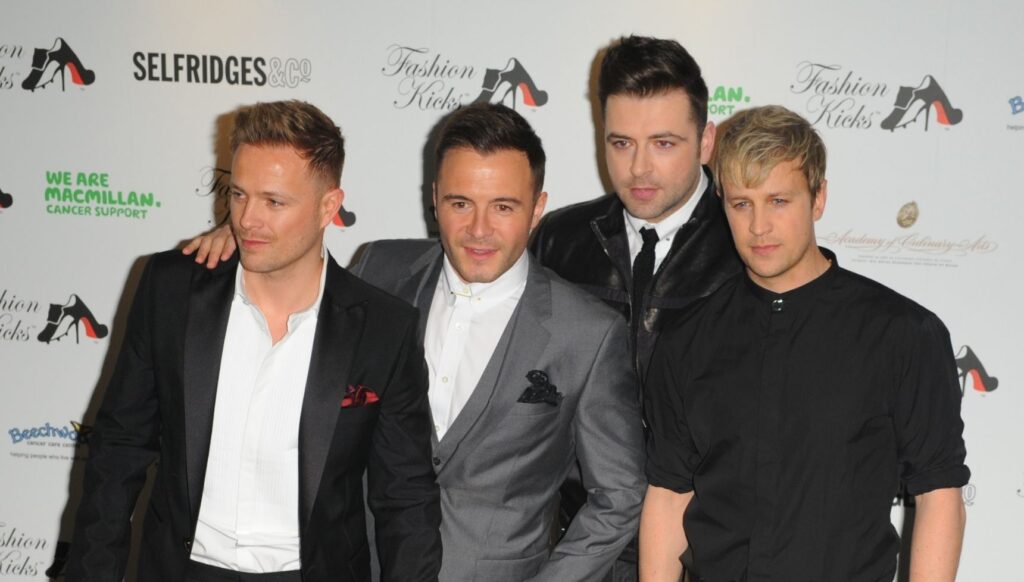 Westlife posing